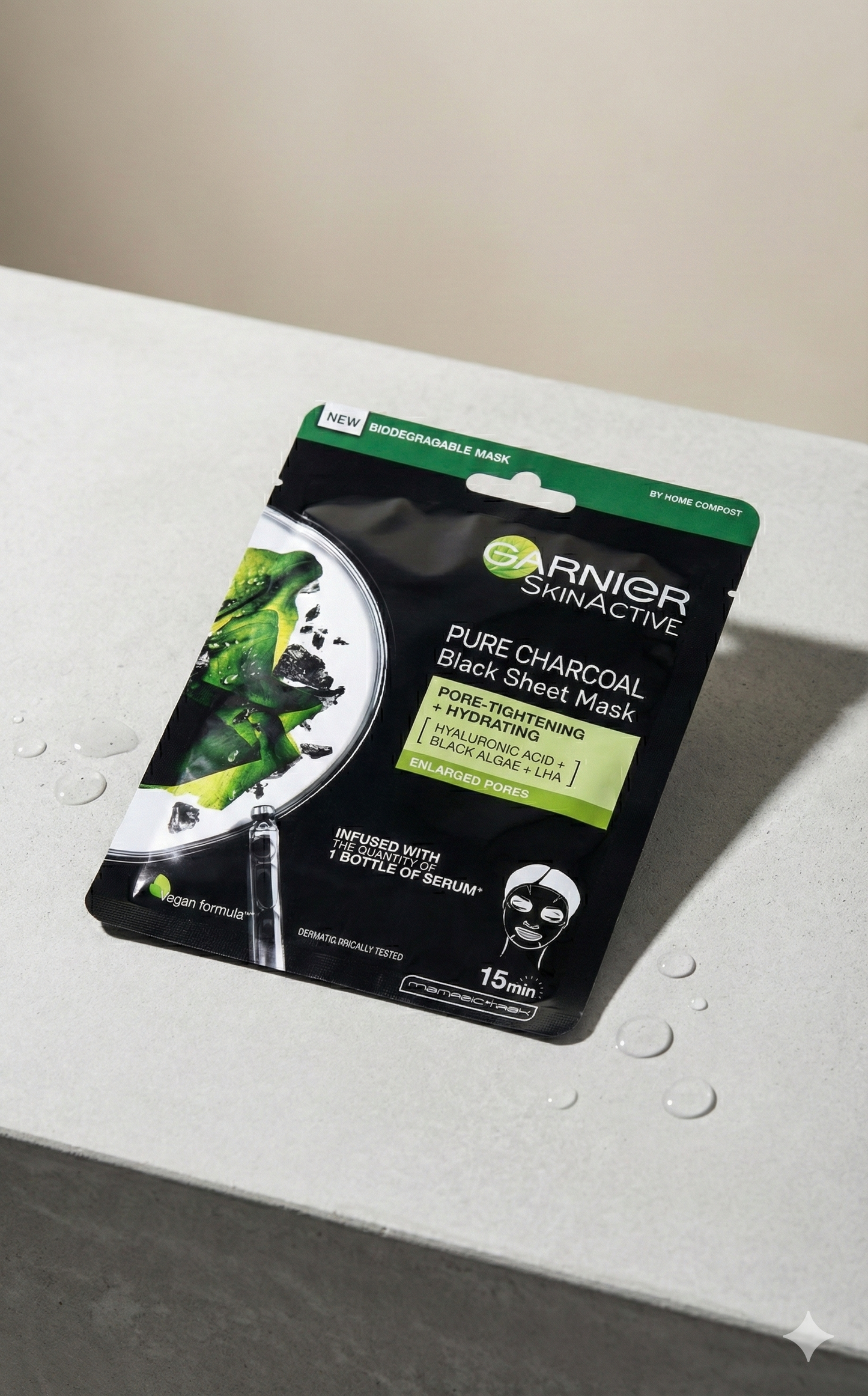 Garnier Saf Kömür Siyah Kağıt Yüz Maskesi - Gözenek Sıkılaştırıcı ve Nemlendirici Etki (Genişlemiş Gözenekler İçin)